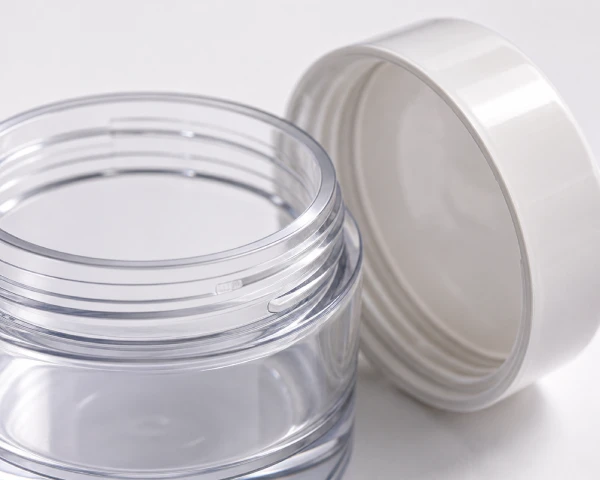Close-up of cosmetic jar thread and neck detail showing precise molding quality